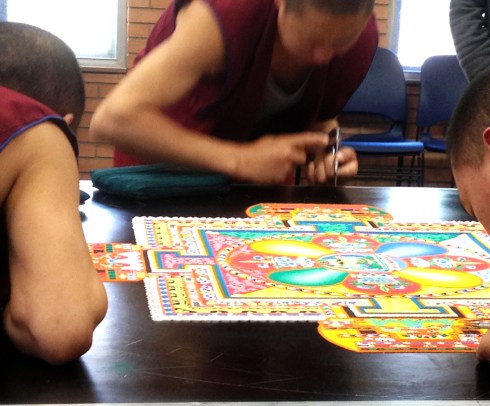 Sand Mandala, two days to go, working from the middle outward to the edge.