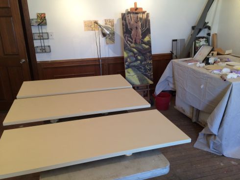 Preparing wood panels, 48" x 20", Baltic birch with buff titanium gesso, 4 coats, sanded between. My studio now covered with a fine dusting of gesso powder. Did I mention I have a new studio?